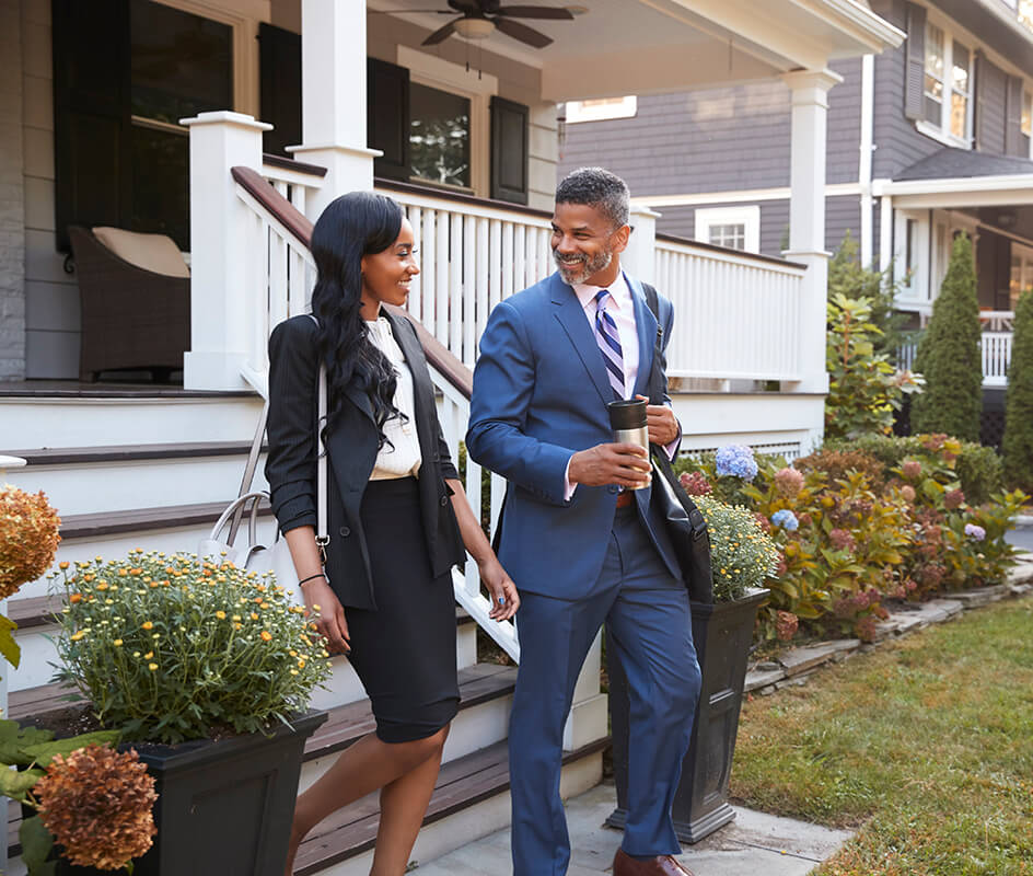 blog/fund_your_trust/business-couple-leaving-suburban-house-for-commute-PY9ZMVK_Sm.jpeg
